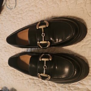 H & M black leather loafers with buckle slip on